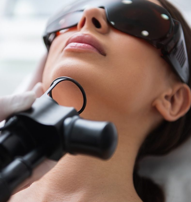 a close up of a person wearing a helmet