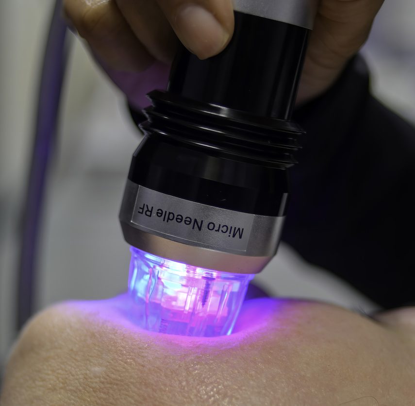 a hand holding a bottle